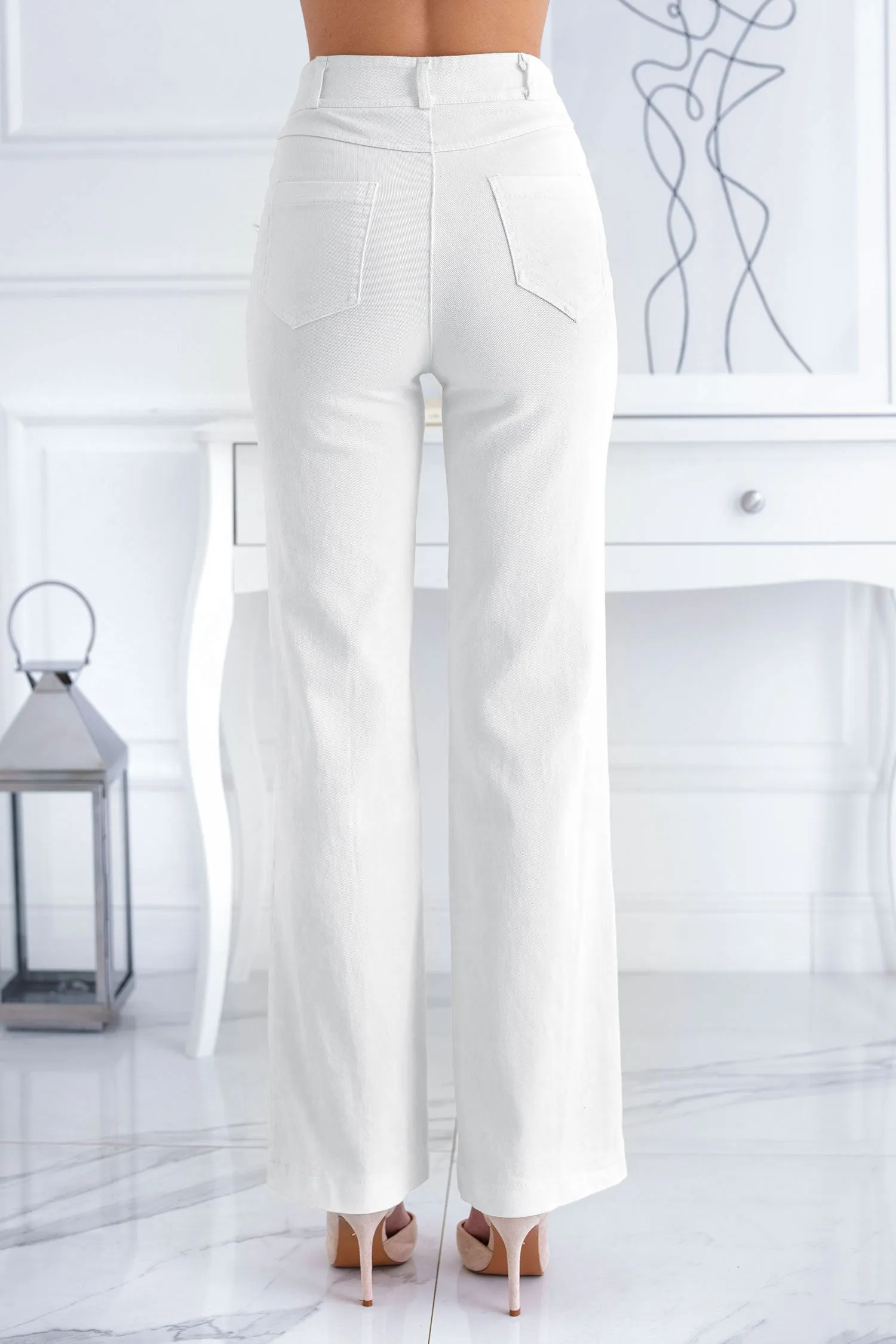 Pantalone bianco in cotone a zampa